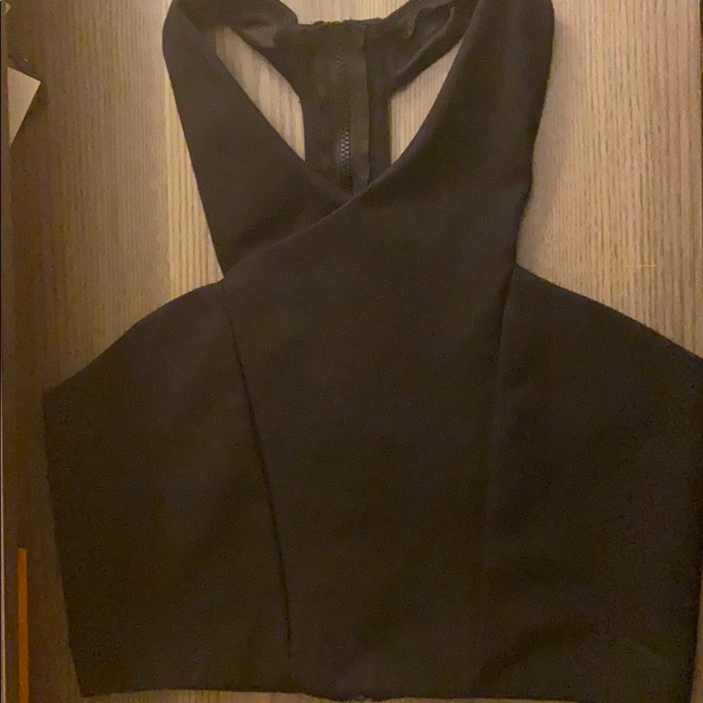 A black express shirt. With zip up back.